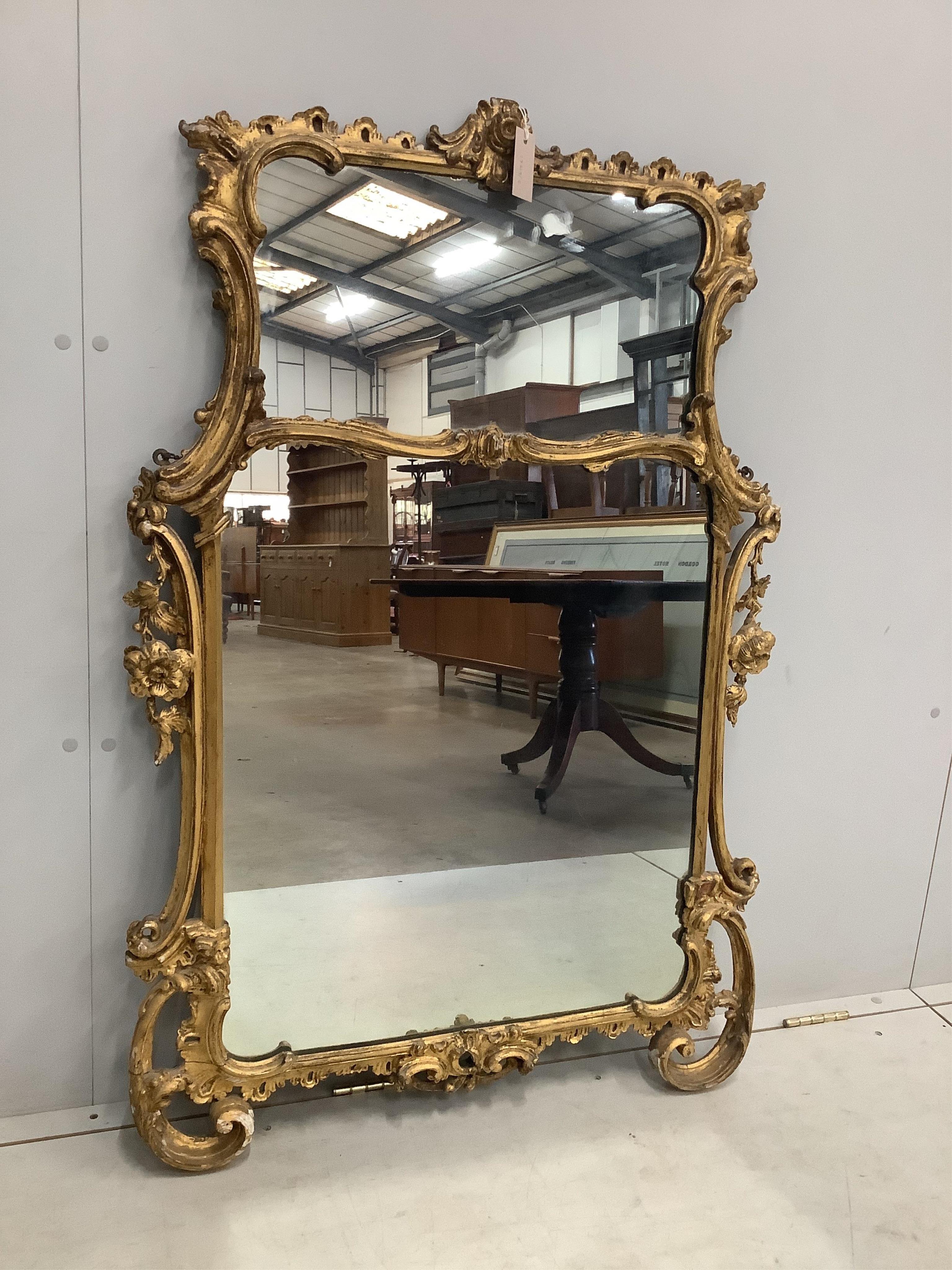A Chippendale Revival giltwood and composition wall mirror, width 80cm, height 116cm. Condition - fair
